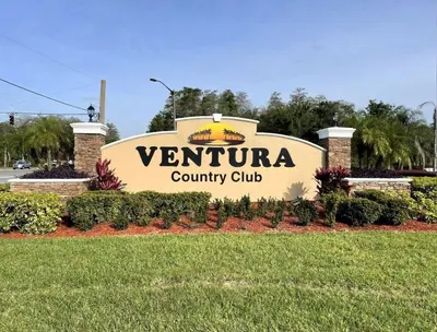 a sign for a county club in a park at 2971 COTTAGE GROVE COURT ORLANDO 3BED in Orlando