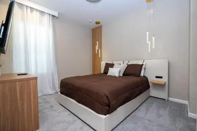 a bedroom with a bed and a television in it at 5761 HS - Spacious Luxury Villa in Paradiso Grande in Orlando
