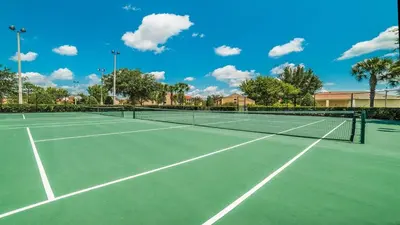 a tennis court with two tennis courts at ALM2813-403 in Orlando