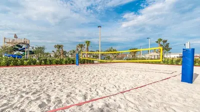 a volleyball court with a volley ball net on a beach at PEQ3141 in Kissimmee