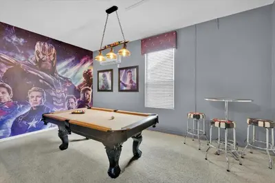 a room with a pool table and a mural at CW7713 Windsor Hills Resort Vacation Home in Orlando