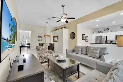 a living room with a couch and a table at CW7713 Windsor Hills Resort Vacation Home in Orlando