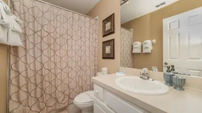 a bathroom with a sink and a toilet and a shower at CW7740 Windsor Hills Resort Vacation Home in Orlando