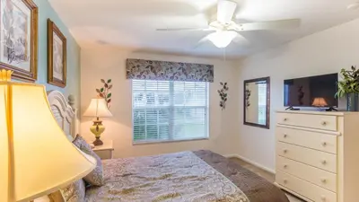 a bedroom with a bed and a ceiling fan at DB2633 Windsor Hills Resort Vacation Home in Orlando