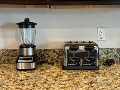 a blender sitting on a counter next to a toaster at Luxury 6BD Encore Resort Disney Pvt Pool Game Room Near Disney Water Park in Orlando