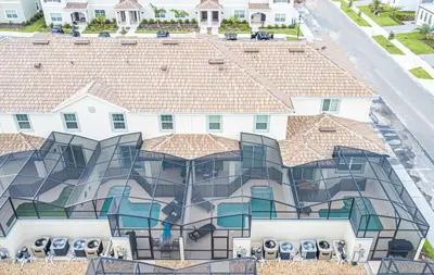 an aerial view of a building with a mural on it at Villa Ariel- Storey Lake in Kissimmee