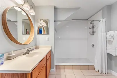 a bathroom with a sink and a shower at 4005 SAN SABASTIAN DRIVE 3BED in Kissimmee
