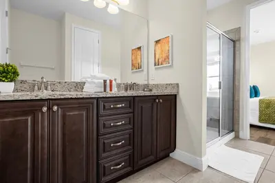 a bathroom with a sink and a shower at Awsome 8 Bd 6.5 Ba Sleeps 20 Encore in Orlando