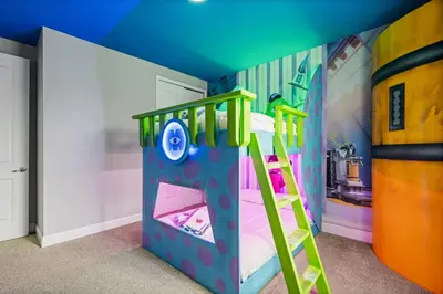 a kids room with a bunk bed with a ladder at 8 Bedroom 6.5 Bathroom Encore at Reunion 7644 in Orlando