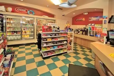 a grocery store with a checkerboard floor at Windsor Palms Condo | Pool, Spa & Near Disney in Kissimmee