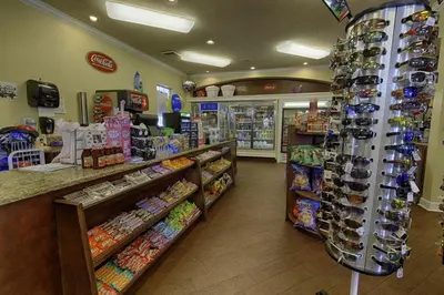 a store aisle of a convenience store with bags of food at Windsor Palms Escape w/ Splash Pool in Kissimmee