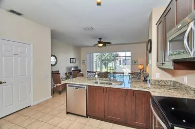 a kitchen with a sink and a counter top at Windsor Palms Escape w/ Splash Pool in Kissimmee