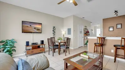 a living room with a couch and a table at SPD2326 in Kissimmee