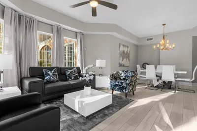 a living room with a couch and a table at 3 Bedroom Family Friendly Condo at WorldQuest near Disney 2729 in Orlando