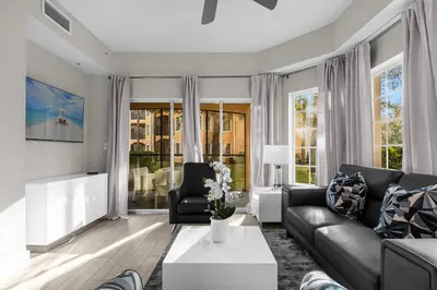 a living room with a couch and a table at 3 Bedroom Family Friendly Condo at WorldQuest near Disney 2729 in Orlando