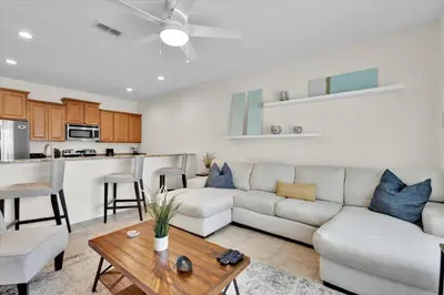 a living room with a couch and a table at CAP8859 in Kissimmee
