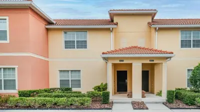 a house with bushes in front of it at CAP8859 in Kissimmee
