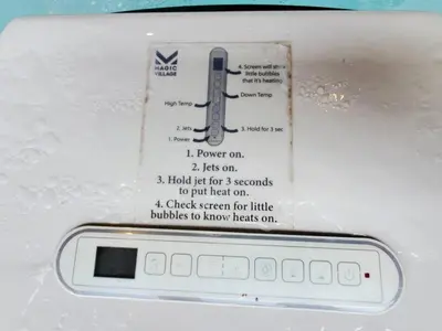 a close up of a microwave with a label on it at Magic Village: 3 suítes c/ jacuzzi, 6min Disney in Orlando