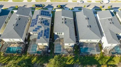 an aerial view of a row of buildings at Ravello Villa Storey Lake in Kissimmee