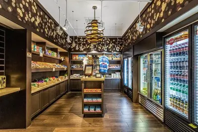 a store aisle of a grocery store with food and drinks at Unit 5203 Worldquest in Orlando