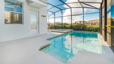 a swimming pool in the middle of a house at KCC4749 in Kissimmee