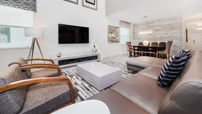 a living room with a couch and a tv at KCC4749 in Kissimmee
