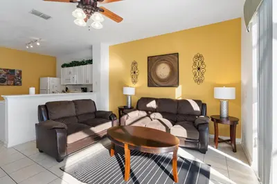 a living room with a couch and a table at Windsor Hills 3 Bedroom Private Pool Townhome 0866 in Orlando