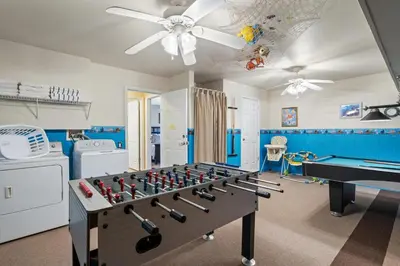 a play room with a ping pong table and a ping pong table at Windsor Hills Resort 5 Bedroom Private Pool Home 0869 in Orlando