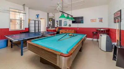 a ping pong room with two ping pong tables at Windsor Palms Resort 4 Bedroom Home With Game Room 0843 in Kissimmee