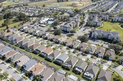 an aerial view of a residential neighborhood with houses at Villa Helena, Windsor Palms in Kissimmee