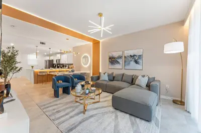 a living room with a couch and a table at 304 Storey Lake new 6guests 2 BDRS near lakeClub in Kissimmee