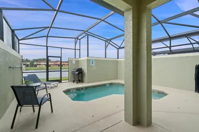 a swimming pool in a building with a glass roof at BCH3071 in Kissimmee