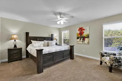 a bedroom with a bed and a ceiling fan at BPD2920 in Kissimmee