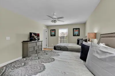 a bedroom with two beds and a ceiling fan at BPD2920 in Kissimmee