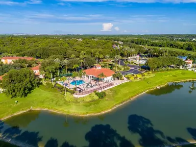 an aerial view of a resort with a pond at CCL8538 in Kissimmee
