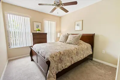 a bedroom with a bed and a ceiling fan at CCL8538 in Kissimmee
