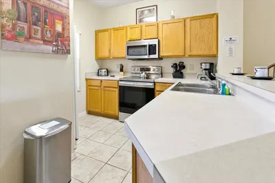 a kitchen with a sink and a microwave at CCL8569 in Kissimmee