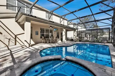 an indoor swimming pool with a glass roof at TT7752 Windsor Hills Resort 6br in Orlando