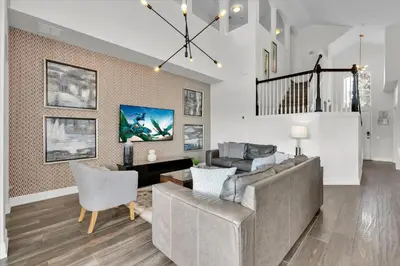 a living room with a couch and chairs at SP8131 Windsor Palms Resort 6 Bedroom in Kissimmee