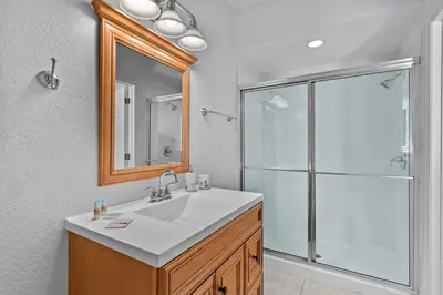 a bathroom with a sink and a shower at Comfortable 3BR Near Convention Center & Epic Park in Orlando