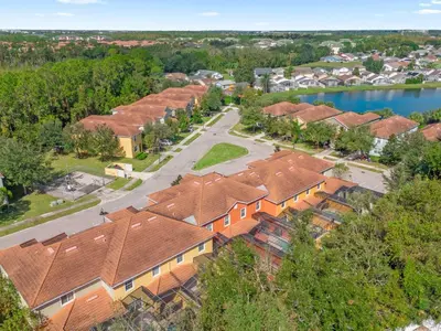 an aerial view of a residential neighborhood with houses at Upstay Family Home w Resort Access & Private Pool in Kissimmee