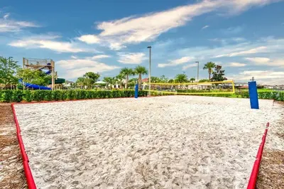 an empty volleyball court at a park at Apartamento 2Q | 10 Min da Disney | Piscina in Kissimmee