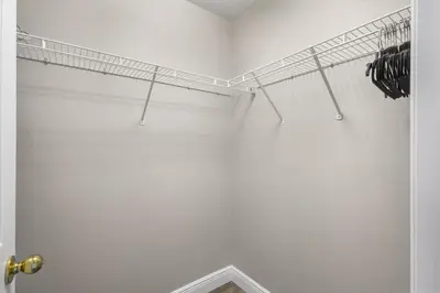 a bathroom with a walk in shower with a towel rack at NEW King Bed Glow In The Dark Kid Cave in Kissimmee