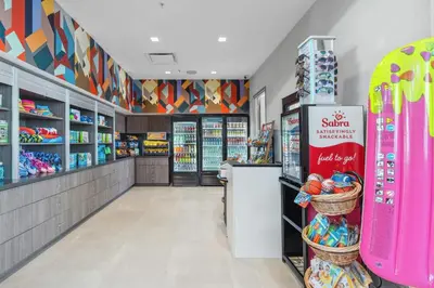 a store aisle of a store with vending machines at SUPER CIELO - 12BDR 11BAs - FUN THEME w POOL in Orlando