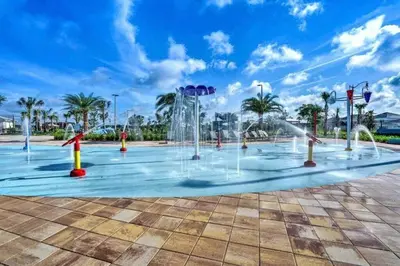 a water park with fountains in a park at Super Chill - 5 Bedrooms WPOOls in Kissimmee
