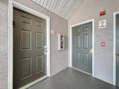 an entrance to a building with a door at Two bed condo in Parkway Palms Resort condo in Orlando