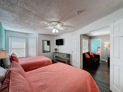a bedroom with two beds and a ceiling fan at Two bed condo in Parkway Palms Resort condo in Orlando