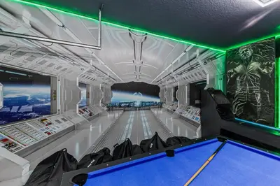 a gaming room with a pool table in it at 295 Marcello Blvd in Kissimmee