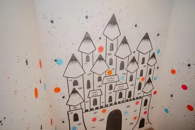 a drawing of a castle on a wall at Special Offer Cozy Townhome at West Lucaya in Kissimmee
