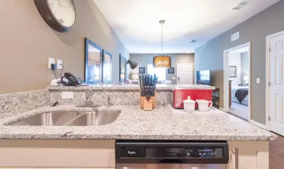 a kitchen with a sink and a counter top at Special Offer Elegant Townhome at West Lucaya in Kissimmee
